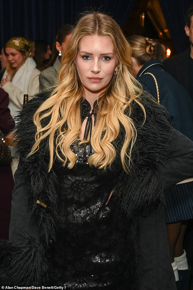 Lottie teamed the coat with a black sequin minidress and black boots