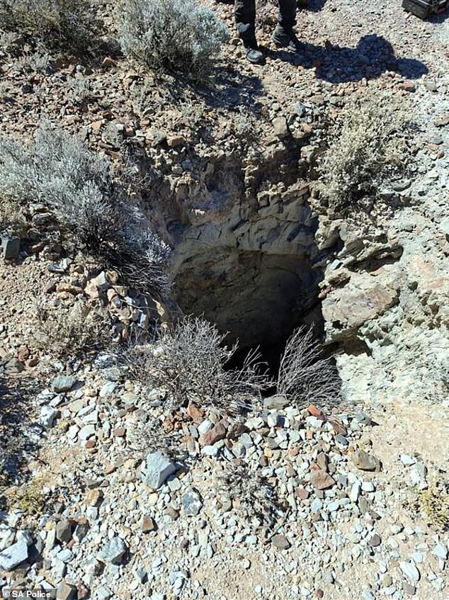 One of the mine shafts (above) that police searched