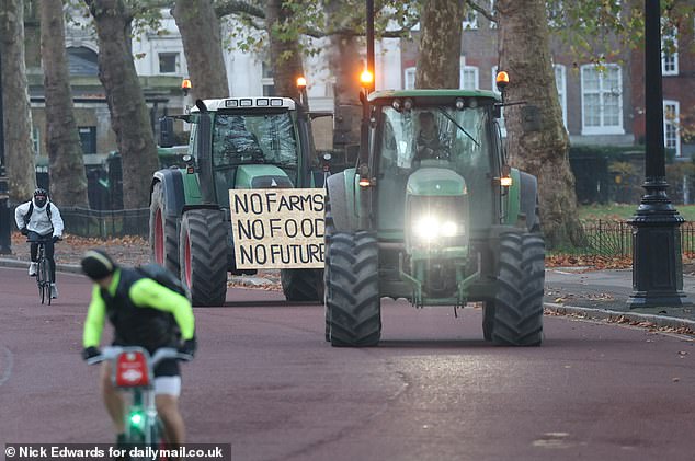 Another sign from defiant agriculturists reads, 'No farms, no food, no future' as they protest against the inheritance tax raid