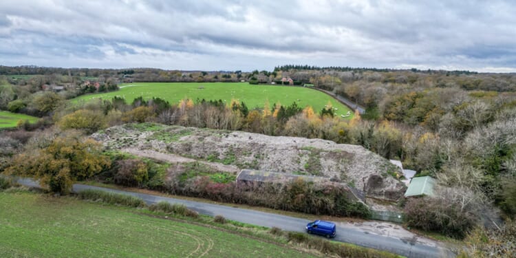 Fury as rubbish mountain 'the size of eight semi-detached houses' is dumped at UK beauty spot