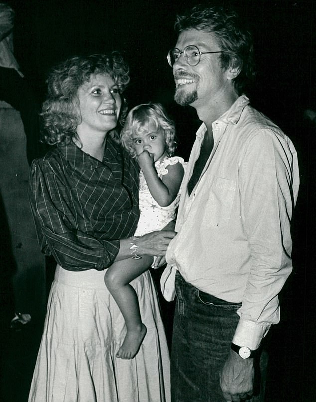 The couple pictured with their daughter Holly. The pair were wed in 1989 when their two children, Holly and Sam, were eight and four