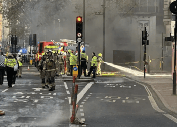 Major fire breaks out in underground tunnel as thick smoke engulfs central London street