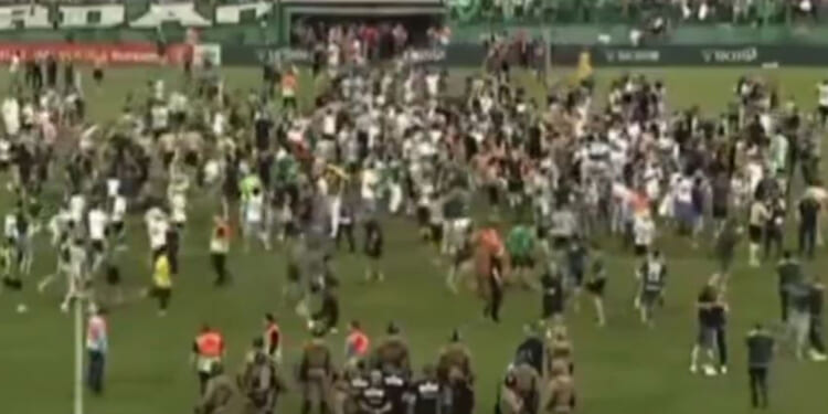 Fans invade pitch as tragedy-hit Brazilian club Chapecoense return to top flight nine years after cup final plane crash