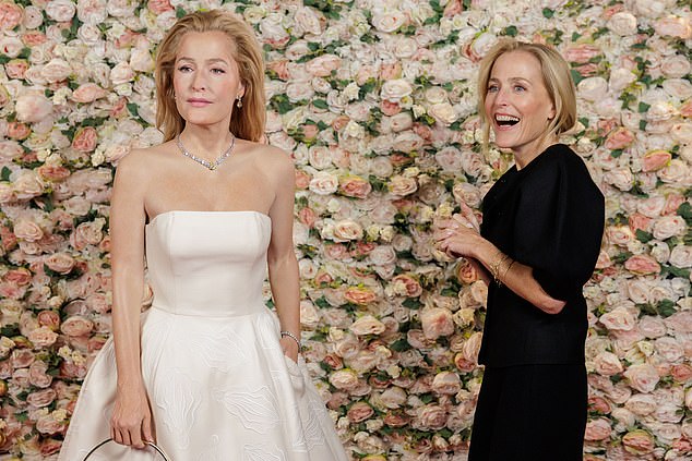 The incredible figure's red-carpet-ready look is complete with stunning diamante jewellery