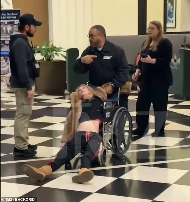 Alarming video shows the American Pie actress, 50, slumped over as she¿s placed into a wheelchair before being taken away on a stretcher to a nearby hospital