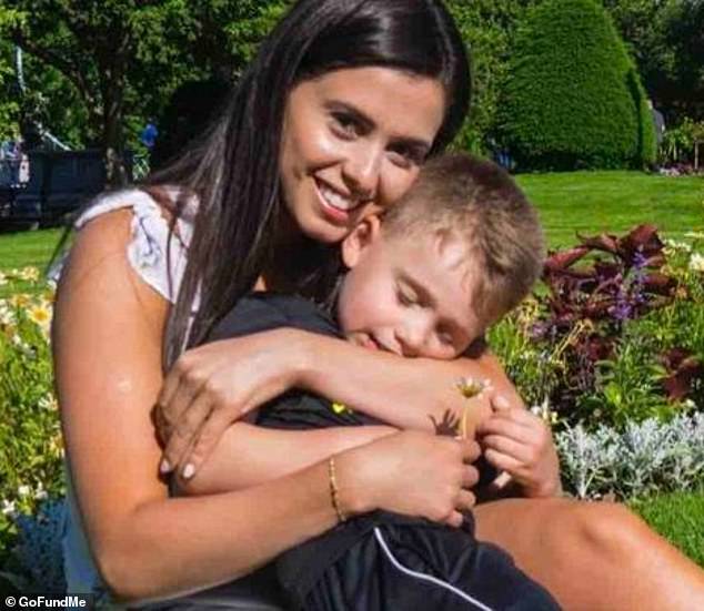 Ferreira was taken into custody in Massachusetts and is currently being held at an ICE facility in southern Louisiana. She has an 11-year-old son with Michael Jr, the two are seen here