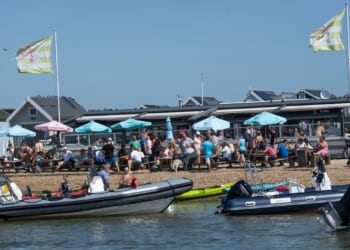 Fuming beach hut owners win fight against ‘unbearable’ restaurant 'turning seaside town into Ibiza & Magaluf rave scene'