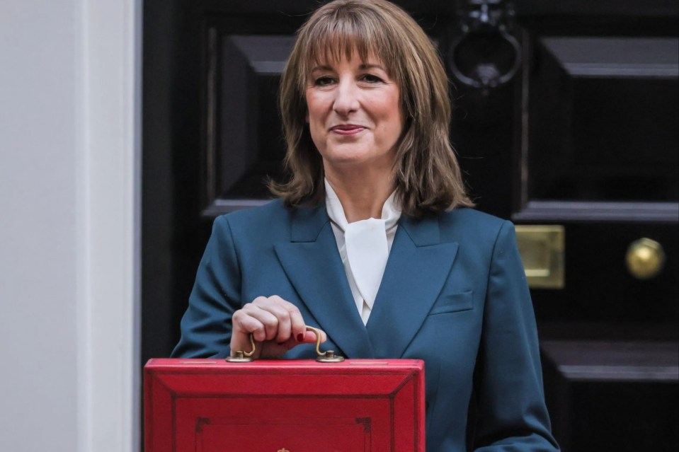 Rachel Reeves, Chancellor of the Exchequer, presents the red budget box outside 11 Downing Street.