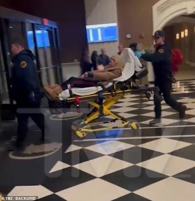 Eventually paramedics arrived and took Reid away on a stretcher