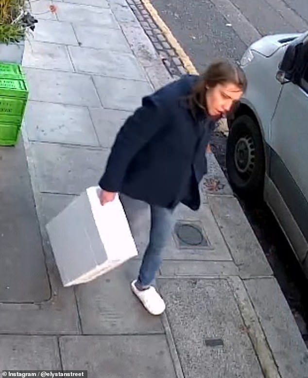 CCTV also captured a woman, dressed in jeans and what appear to be slippers, walking up to the front of Elystan Street at around 8am on Tuesday