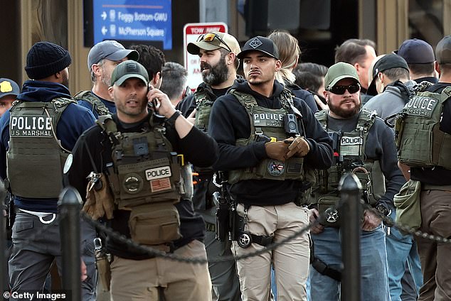 Members of law enforcement, including the U.S. Marshals