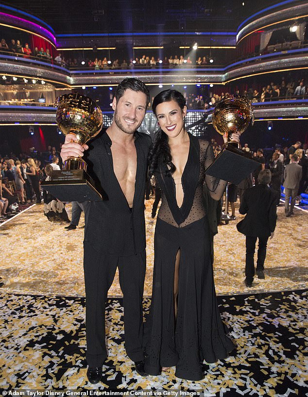 The Rumor Has It life coach won the Len Goodman Mirrorball Trophy with partner Valentin Chmerkovskiy (L) during season 20 in 2015