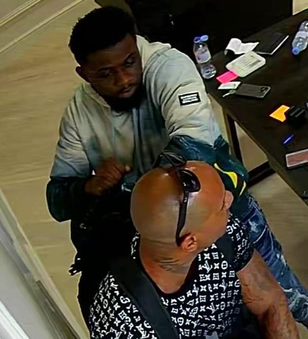 Kyle Mehmet (front) and Junior Kunu (back) are seen during the heist at the jewellery store in Richmond . Mehmet was found guilty but Kunu was cleared