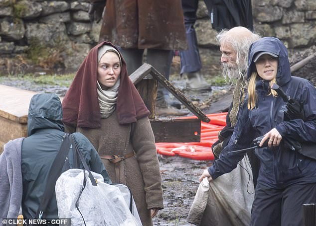 The actress, 26, was seen for the first time filming for the medieval horror, Werwulf, on a specially-built set in Surrey, wearing prosthetics to appear as though she had a cleft lip