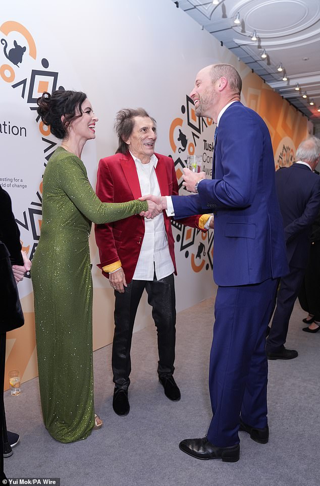 Shaking hands with Prince William, the trio shared a warm laugh together, as the royal told Ronnie he was one of the longest-serving ambassadors of the trust