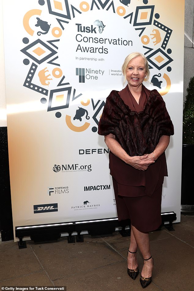 Dragon's Den star and entrepreneur Deborah Meaden caught the eye in a burgundy dress with a fur stole