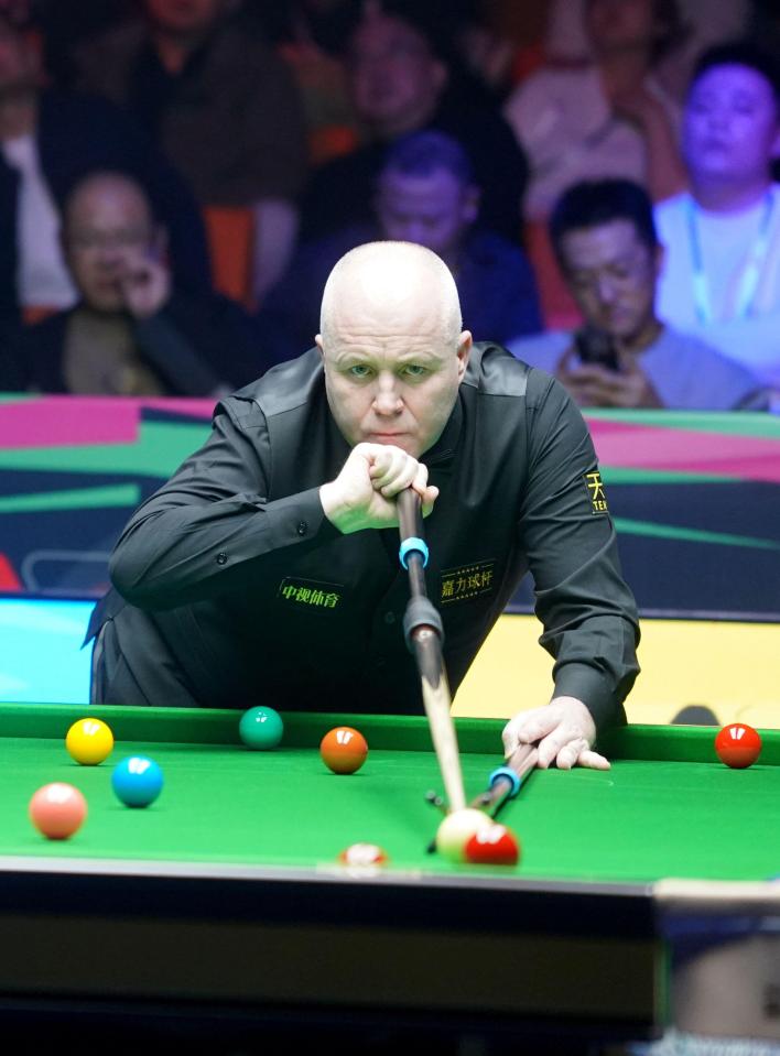 John Higgins competing in the final match of the 2025 World Snooker Tour International Championship.