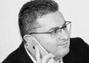 Man fell head first off office balcony while ‘leaning over railing to take pic’ as he sues boss for millions