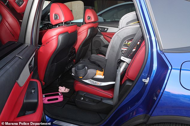 The Chicco seat on which Parker was sitting is visible in this photo. On the floor below Parker's feet was an iPad with a pink case, and two tiny pink child-sized sandals