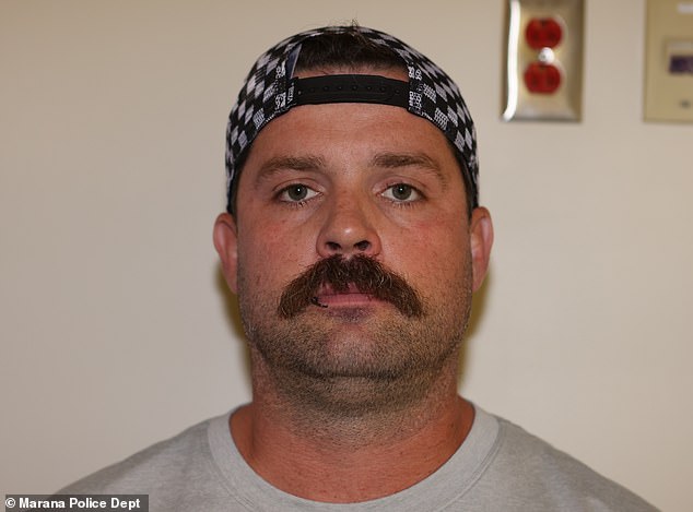 Scholtes in a photo taken by police on the day that Parker died, wearing a Vans cap backwards, a lip ring and flip-flops