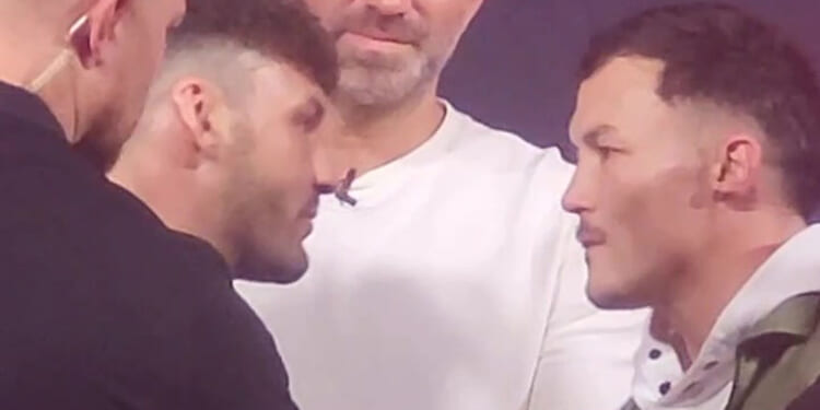 Moment Leigh Wood and Josh Warrington have to be pulled apart by security in heated face-off