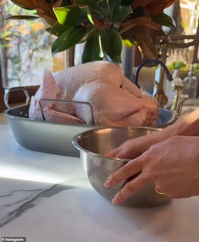 In the short clip shared on Instagram earlier in the week, the actress mixed a variety of seasonings into a bowl, rubbing the mixture onto the raw bird to then put it into the oven - much to the disgust of viewers, who slammed it for being unsanitary if she didn't wash her hands