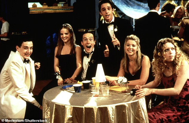 Reid, pictured second R, is memorably known for her role in the high school film American Pie
