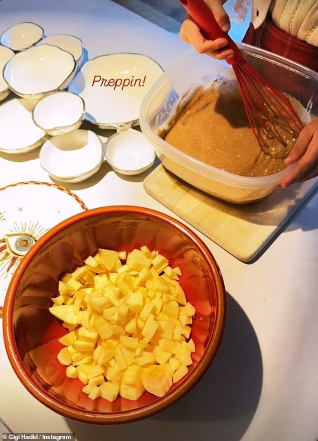 Gigi Hadid also treated her fans to a glimpse of her 'Preppin!' the feast she will share with loved ones including her daughter Khai, five, whom she had with Zayn Malik