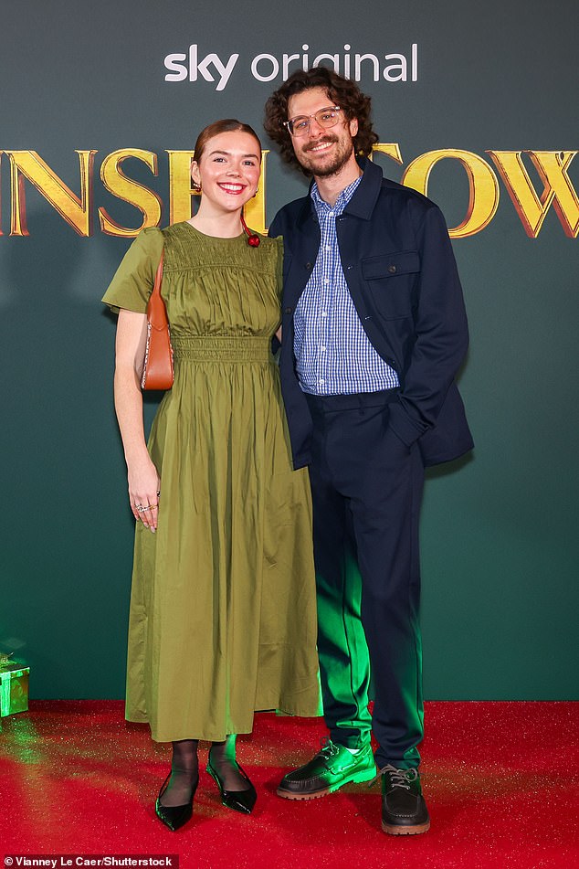 Hannah Townsend looked stylish in a khaki dress as she posed with Benedict Townsend