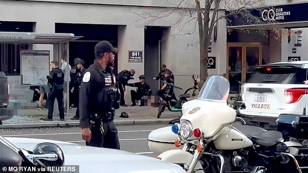 Footage emerged from the scene on Wednesday showing first responders performing CPR on a troop shot in the head