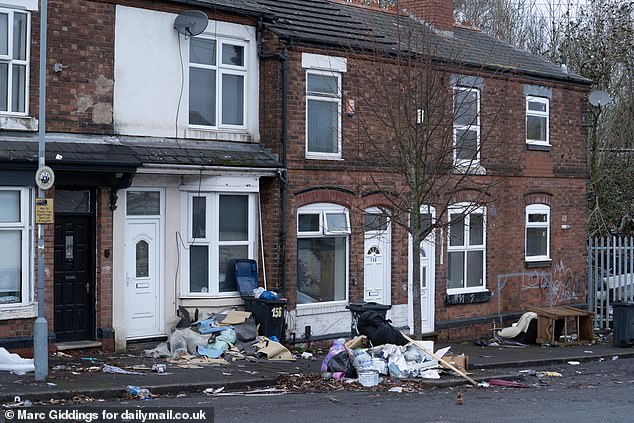 While many of Doris' neighbours don't work and live off state handouts, the pavement in front of her home is piled four feet high with rubbish