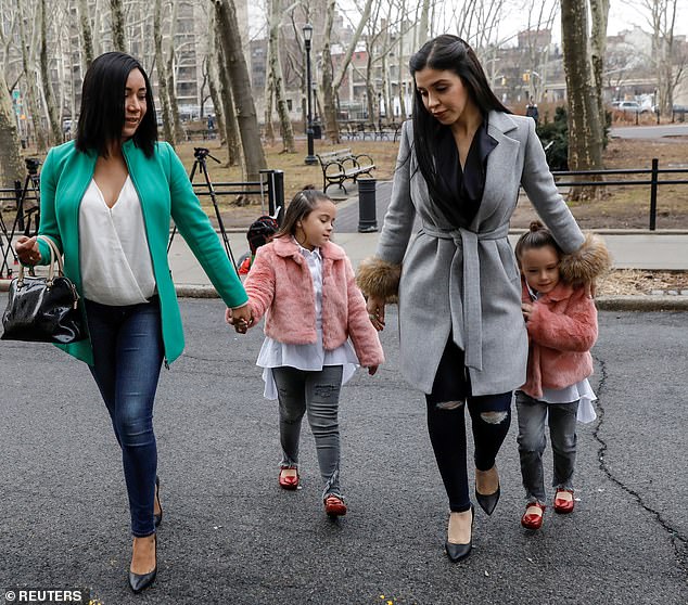 Coronel Aispuro is pictured with the couple's twin girls arriving at the Brooklyn Federal Courthouse in 2018