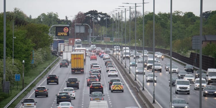 Huge delays on M4 after horror crash between motorbike and car closes major commuter road in both directions