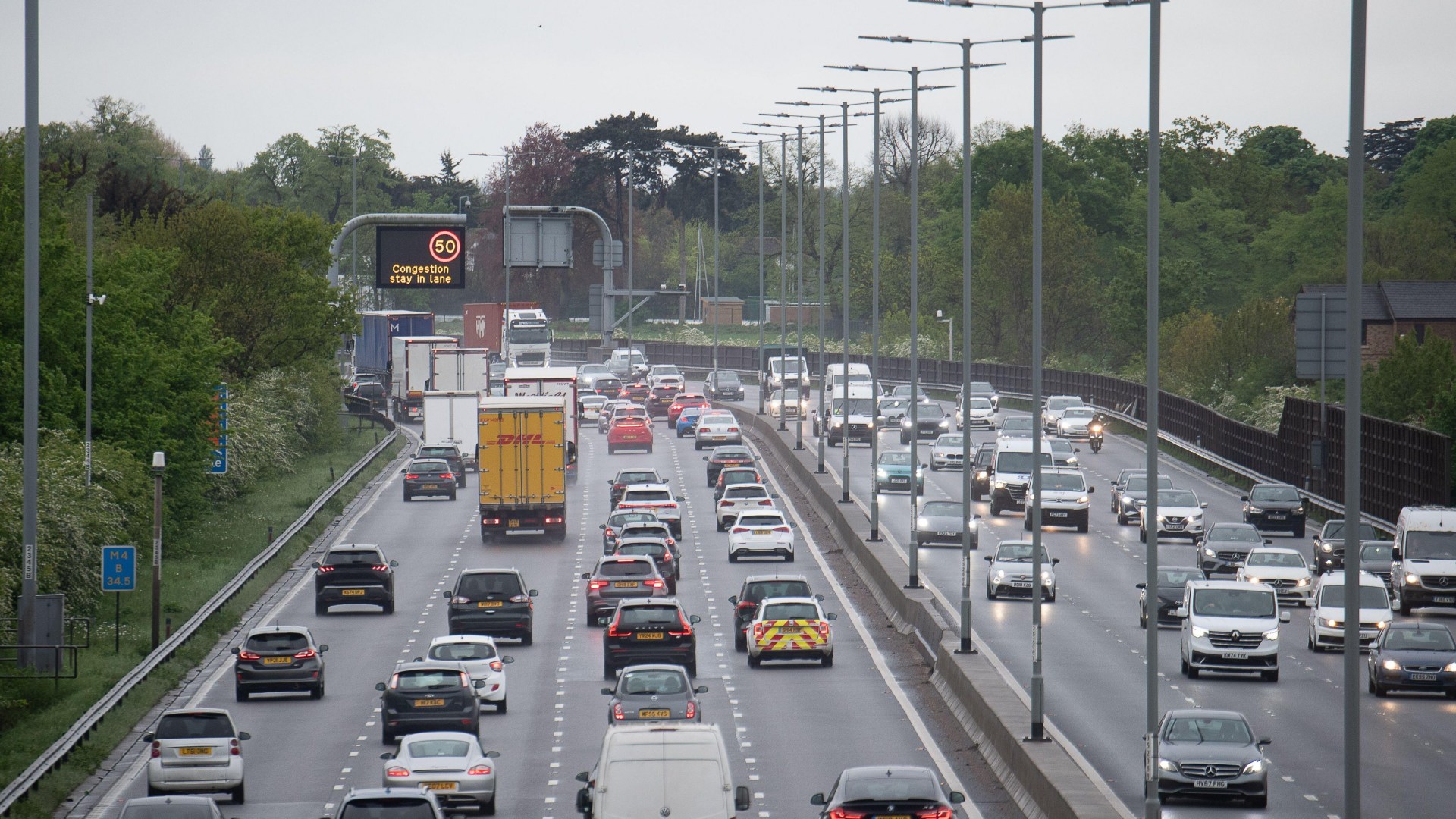 Huge delays on M4 after horror crash between motorbike and car closes major commuter road in both directions