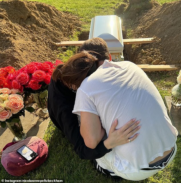 The chihuahua fell ill after a mobile grooming session in New York. She later died after being rushed to an emergency vet (Nicola and Brooklyn pictured at Nala's grave)