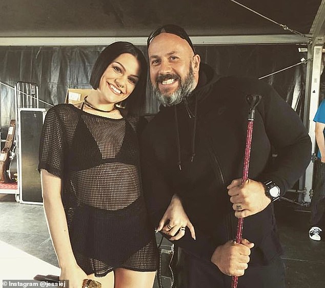 Dave died unexpectedly in 2018 with the singer describing him as family following his death (pictured together)