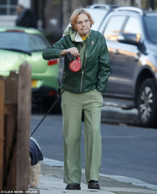 Jackiey Budden on a dog walk while smoking