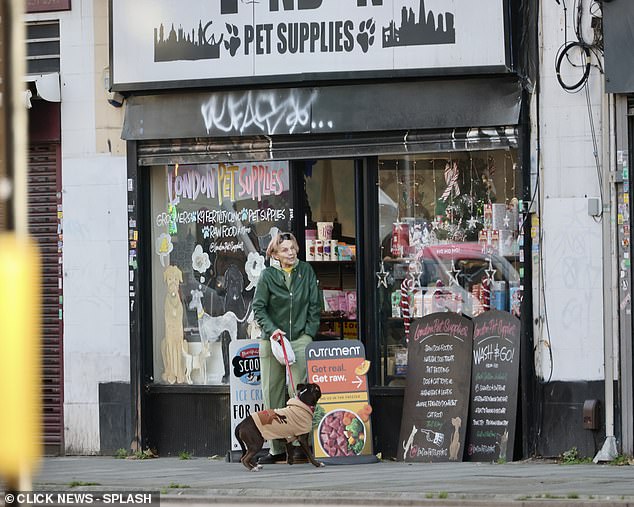 Jackiey pictured leaving a pet shop in Bermondsey