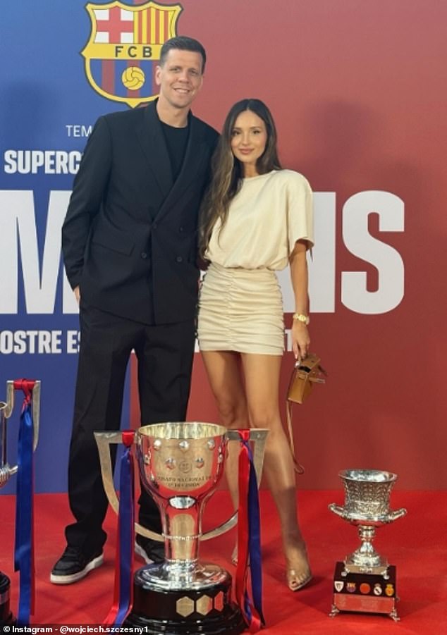 The Polish stopper is pictured with his Ukrainian pop star wife Marina Luczenko