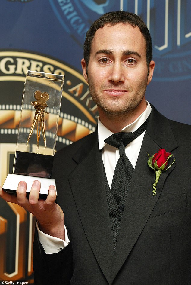 Faris married cinematographer Michael Barrett in 2021; (Barrett pictured in 2003)