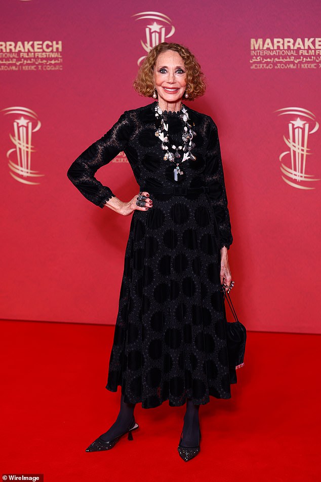 Marisa Berenson, 78, showed off her ageless looks in a black lace dress which she paired with a chunky necklace and pearl earrings