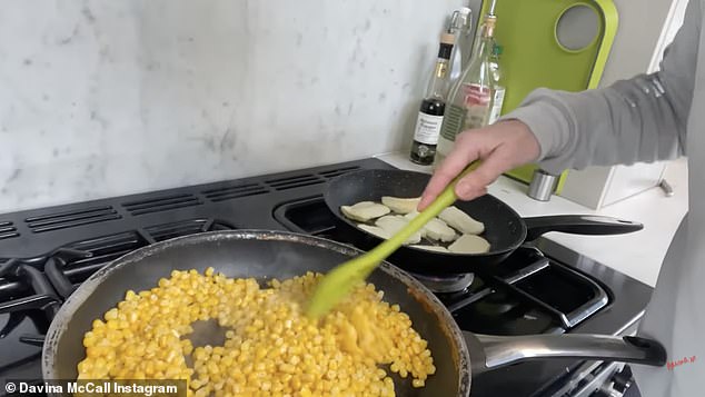 Explaing what she has for lunch in a video, Davina fried sweetcorn with a tiny bit of butter while cooking sliced halloumi to eat with a side of salad, cooked carrots, falafel and hummus