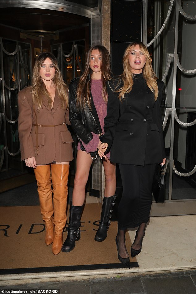 The model, 39, stunned in the figure-hugging dress, which she paired with a double-breasted black jacket