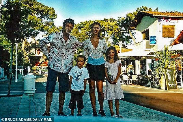 Ms Burgess pictured with her late husband, Craig, who died of a brain tumour in 2016, and children Jackson and Gina