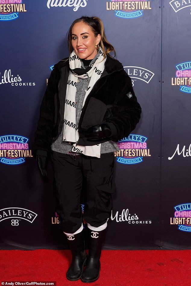 Lauryn Goodman put on a stylish display in a pair of Chanel wellies, which she paired with dark trousers and a matching cropped jacket