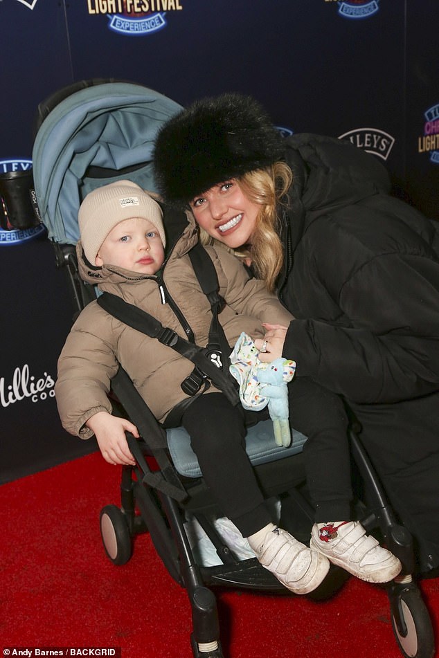 Also in attendance with Amy Hart who is already mum to Stanley, two, who dressed for the weather in a fur hat, burgundy jumper and coat