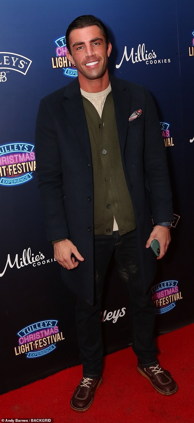 Former Love Islander Jack Fincham, 34, donned a khaki cardigan paired with a white T-shirt, skinny jeans and brown shoes. He completed his ensemble with a long navy coat and slicked his dark locks back