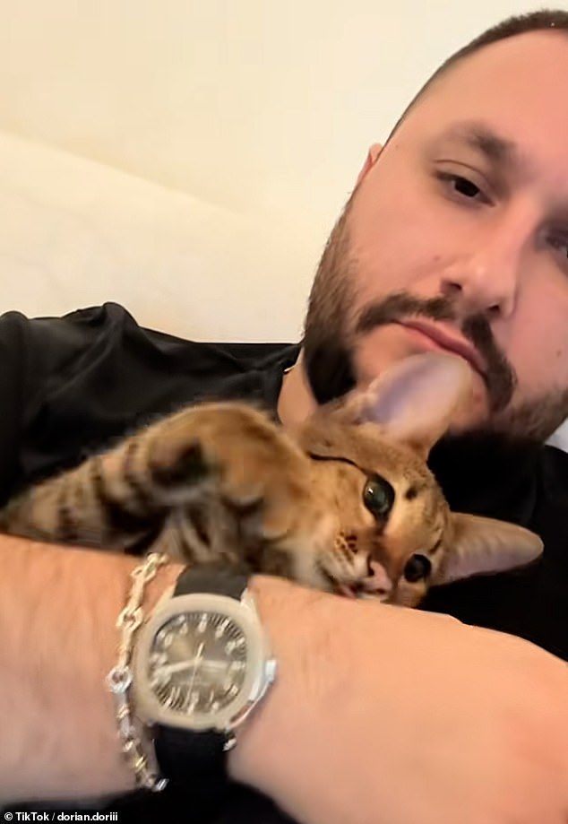 Puka shows off a designer watch in a selfie