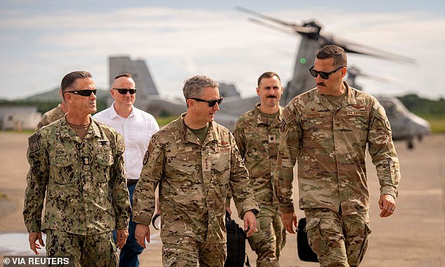 Gen Dan Caine, centre, with senior military personnel at the Jose Aponte Airfield in Puerto Rico during his visit on November 24