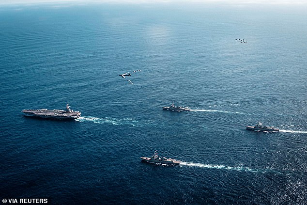 The US Navy's Gerald R. Ford Carrier Strike Group, and supporting vessels sailing towards the Caribbean earlier this month. The Ford is the largest aircraft carrier in the world